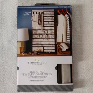 Jewelry organizer, hanging. New in packaging.